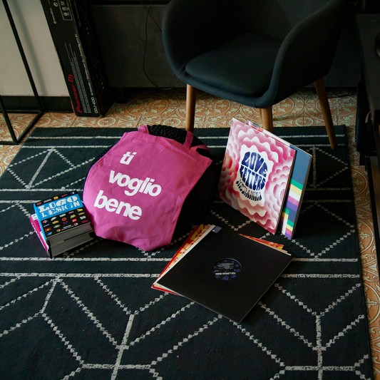 Tote bag Ti voglio bene, in 100% cotone organico. Fucsia con scritta bianca.